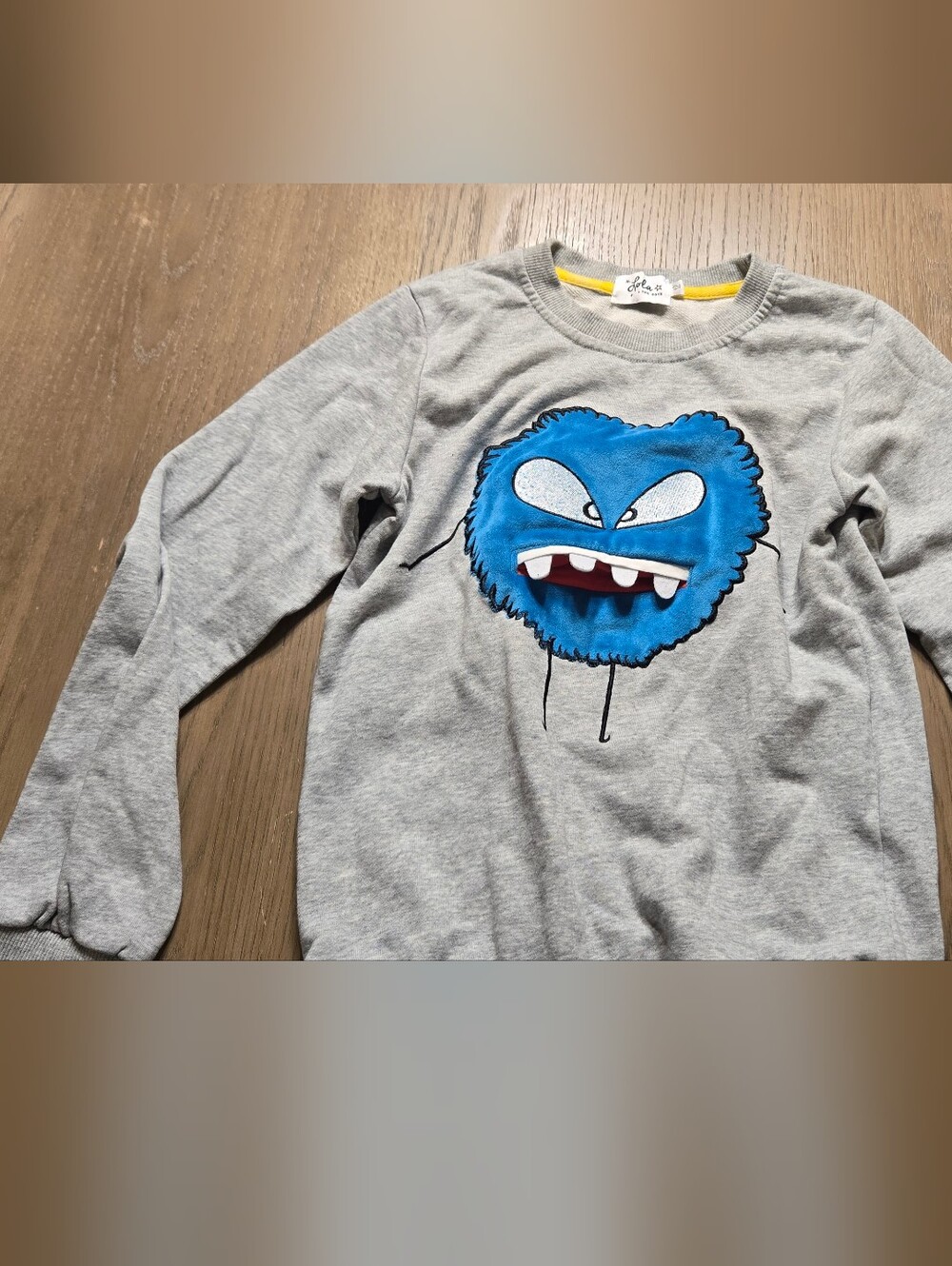 Lola + The Boys Gray Sweatshirt with Bright Blue Monster Graphic
